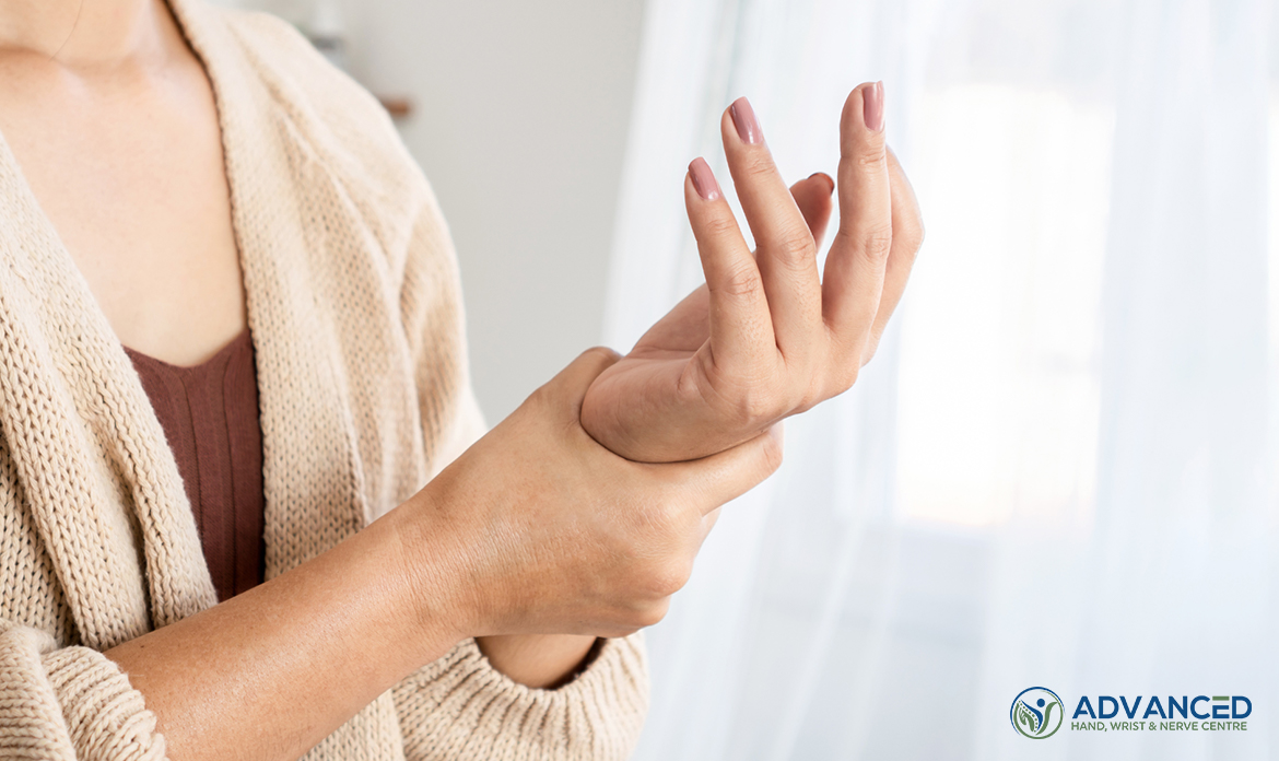 Image Woman suffering from wrist pain numbness or Carpal tunnel syndrome