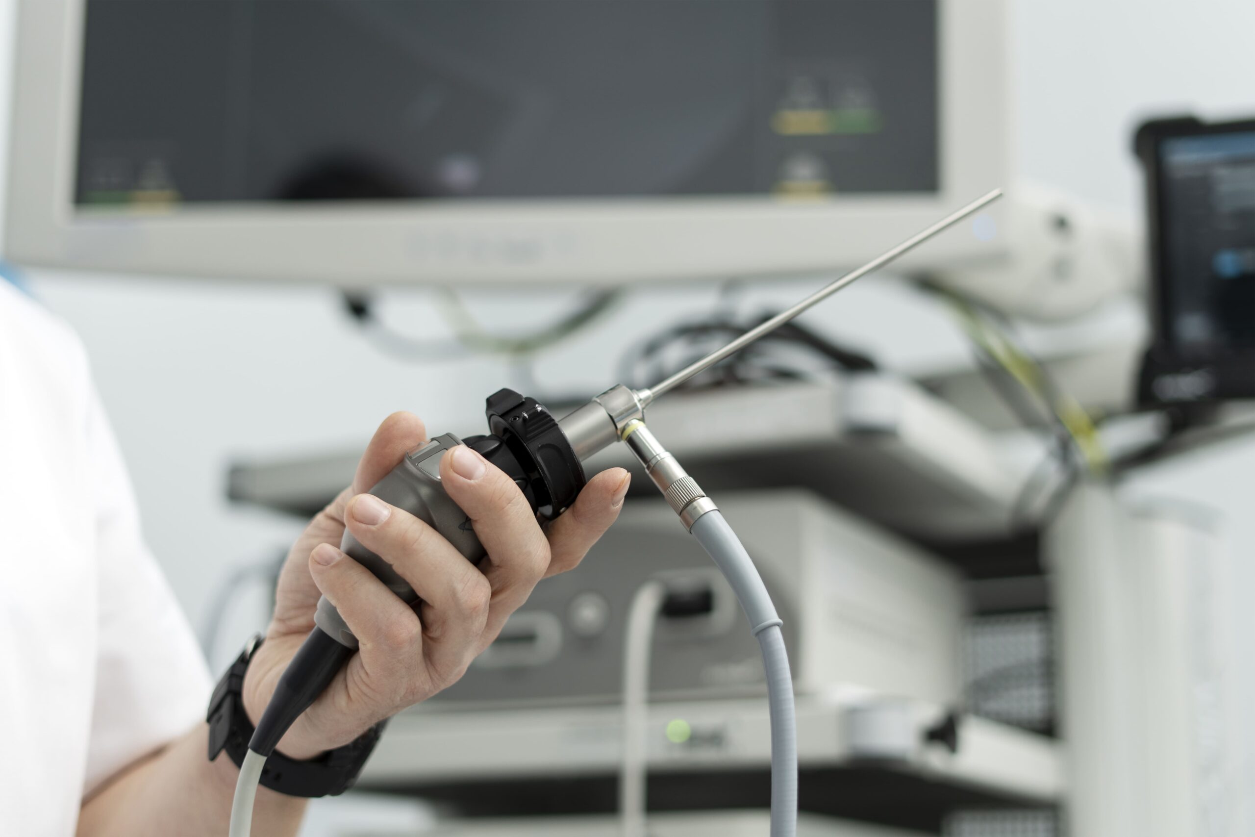 Image man holds a medical endoscope on the background o 2024 10 18 09 25 55 utc